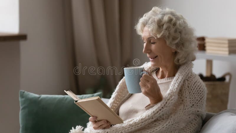 Excited middle aged elderly granny enjoying weekend hobby time. stock images Excited middle aged elderly granny enjoying weekend hobby time. stock images