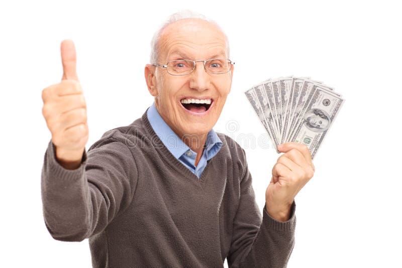 Excited senior holding money and giving a thumb up