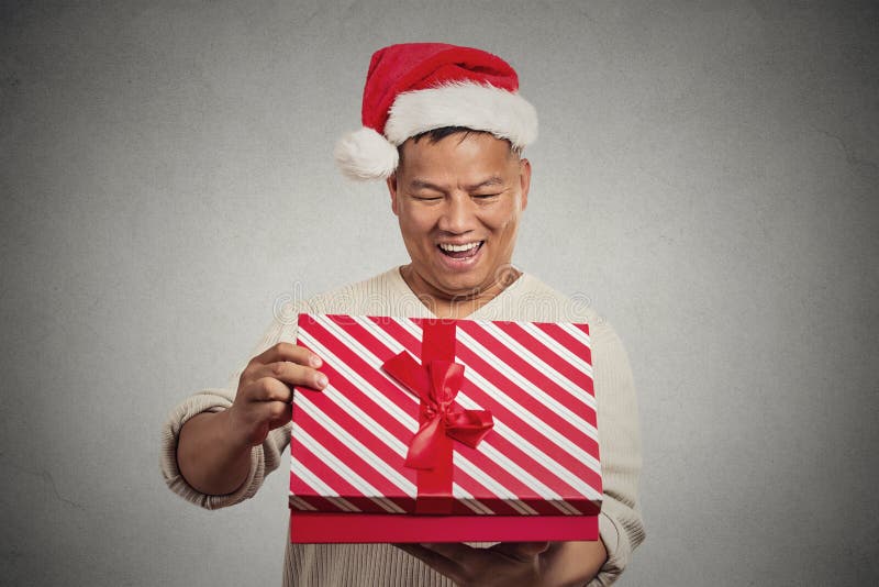 Excited Surprised Middle Aged Man Opening Unwrapping Red Gift Box Stock