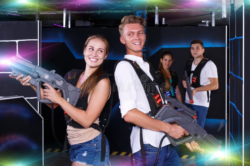 An Image Of A Young Boy Girl Team Playing Laser Tag Game Isolated