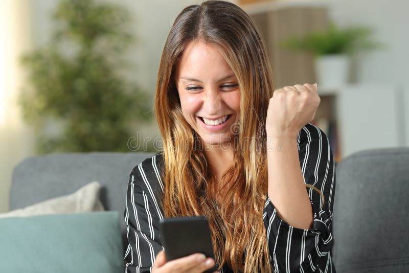 606 Excited Woman Checking Phone Stock Photos Free And Royalty Free