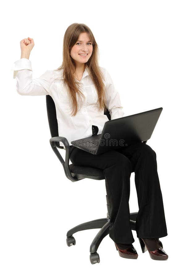 Excited woman with laptop enjoying success