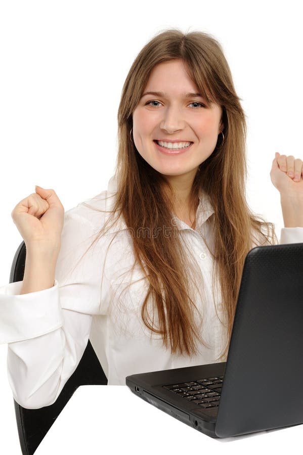 Excited woman with laptop enjoying success