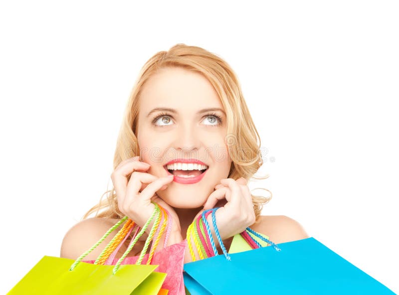 png An attractive woman looking excited while holding up shopping bags   Buy Stock Photo on PeopleImages, Picture And Royalty Free Image. Pic  2835822 - PeopleImages