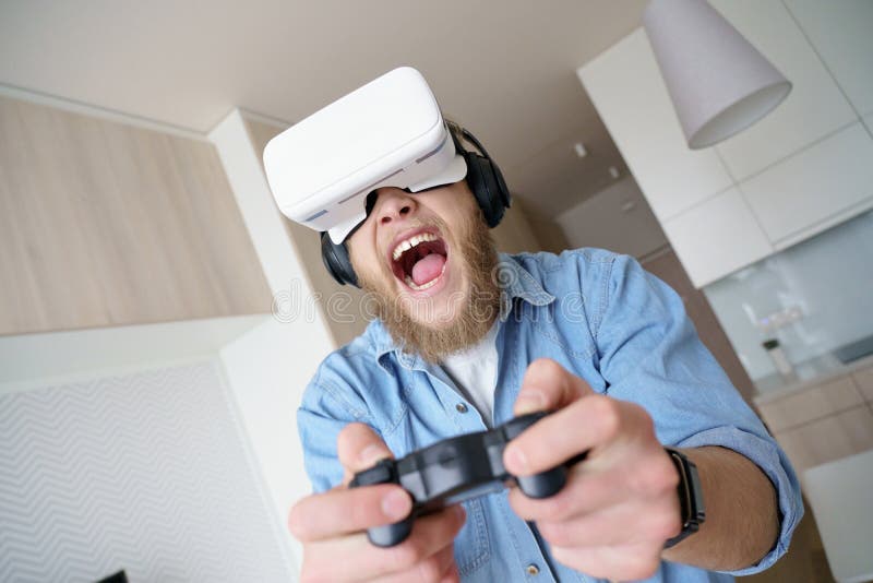 Excited Young Man Wearing Vr Glasses Holding Controller Playing Video Game Stock Photo - Image of excited, modern: 173548290 Excited Young Man Wearing Vr Glasses Holding Controller Playing Video Game Stock Photo - Image of excited, modern: 173548290