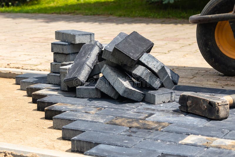 Execution of the Paving Stone Surface and Leveling. Stock Image Image of brick, tarmac 282106353