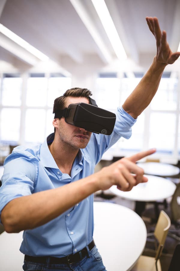 Executive Enjoying Virtual Reality Headset at Office Stock Image