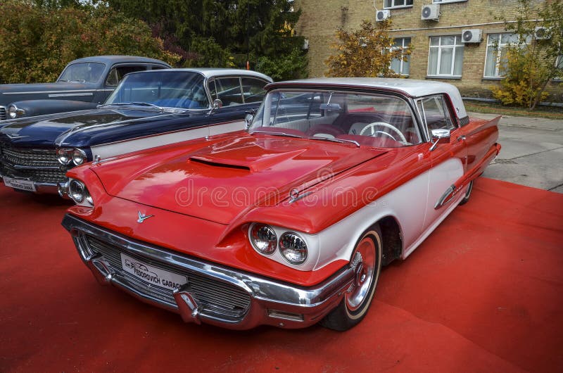 Executive four-seat coupe Ford Thunderbird with a powerful seven-liter engine and a three-speed automatic transmission at the "Old Car Land" retro car festival in Kyiv. Old thunderbird stock images, royalty-free photos and pictures