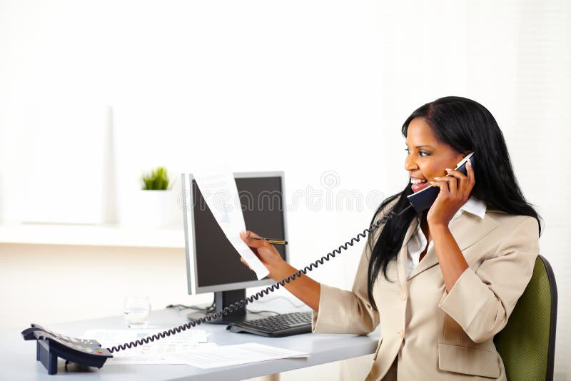 Executive on phone and looking to documents royalty free stock photos Executive on phone and looking to documents royalty free stock photos