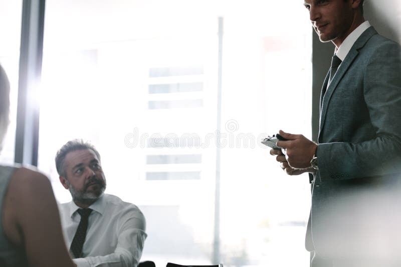 Executive talking with colleagues during a meeting royalty free stock images Executive talking with colleagues during a meeting royalty free stock images