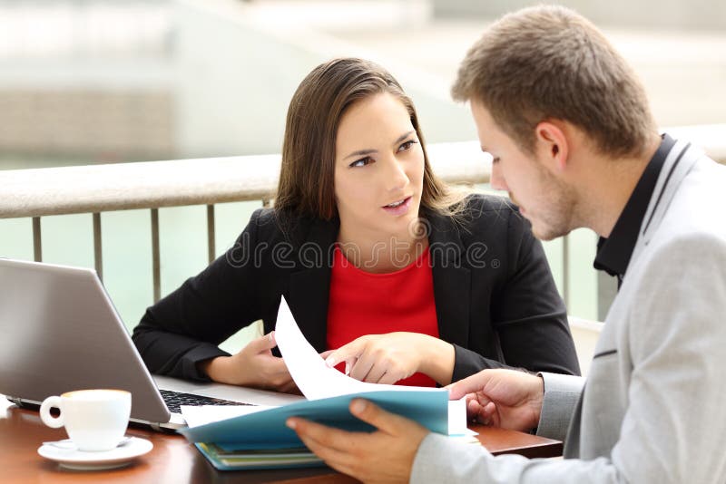 Executives having a business conversation in a bar royalty free stock photos
