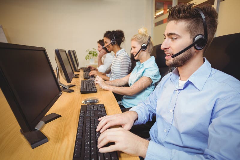 Executives working in call center stock photos Executives working in call center stock photos