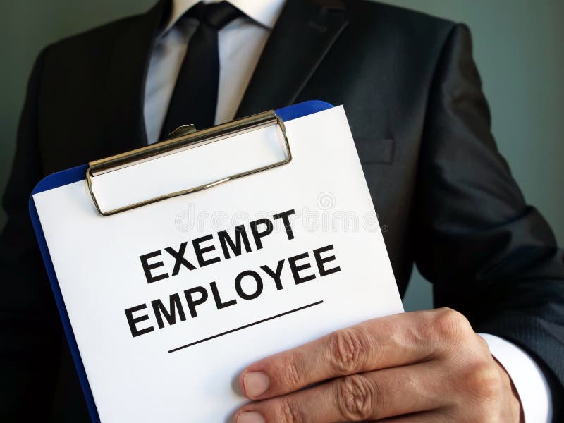 Exempt Employee Sign Is In The Hand Stock Photo Image of