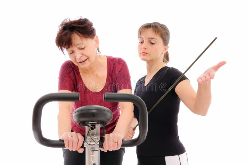 Entraîneur forçant à faire de l'exercice photos stock
