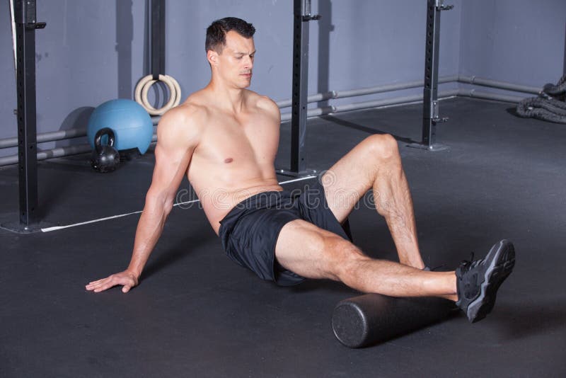 Exercice noir de sport de petit pain de massage photos stock