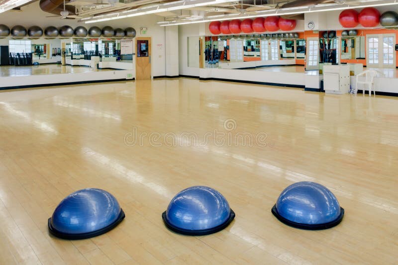 Exercise balls in gym stock photo. Image of stretching 23937896