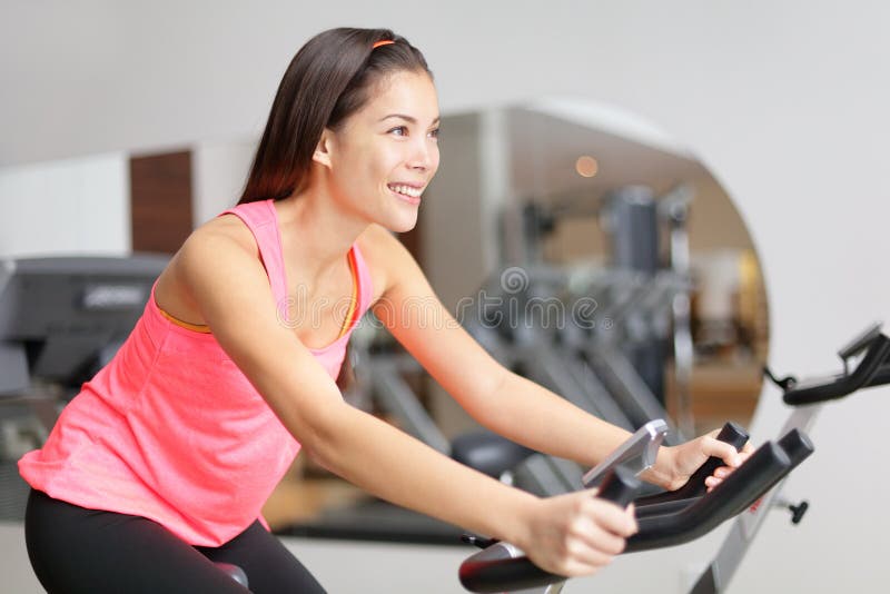 Exercise bike fitness woman excising stock photo Exercise bike fitness woman excising stock photo
