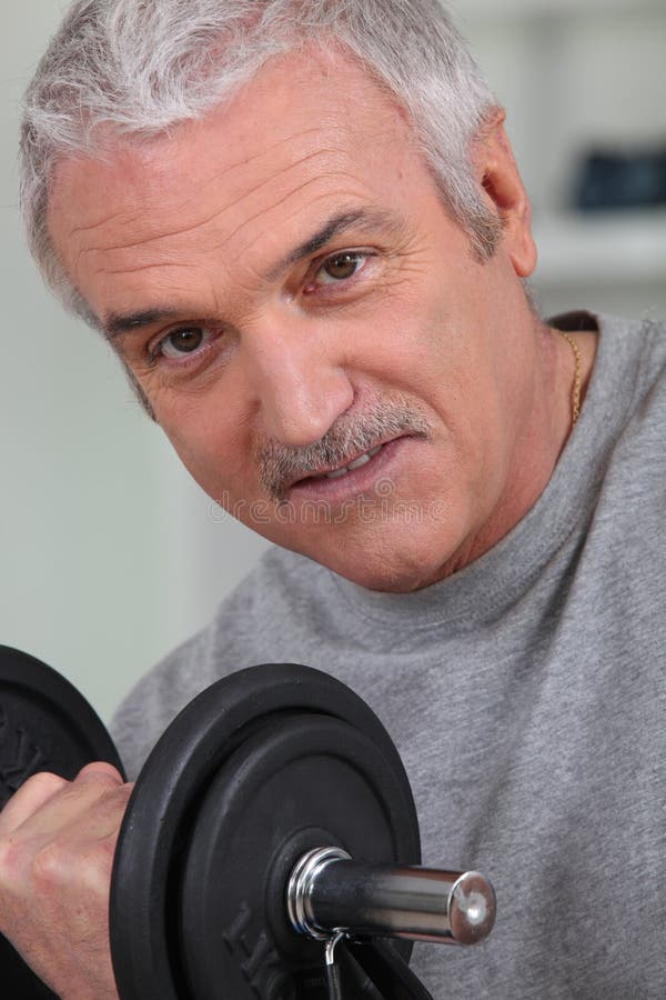 Exercício do homem sênior foto de stock Exercício do homem sênior foto de stock
