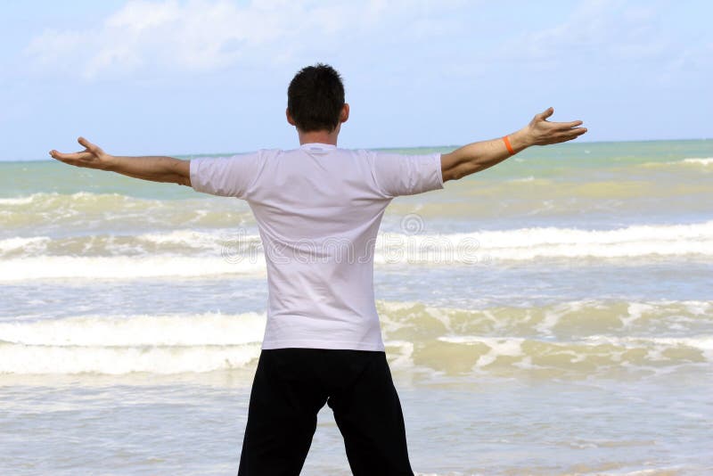 Exercícios de treino na praia fotos de stock