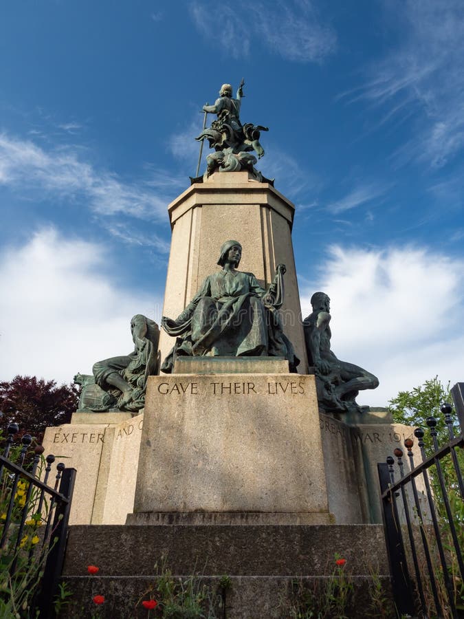 EXETER, DEVON, UK - August 3 2021: Back view of Exeter War Memorial in Northernhay Gardens.  The lower nearest statue depicts a female Voluntary Aid Detachment nurse