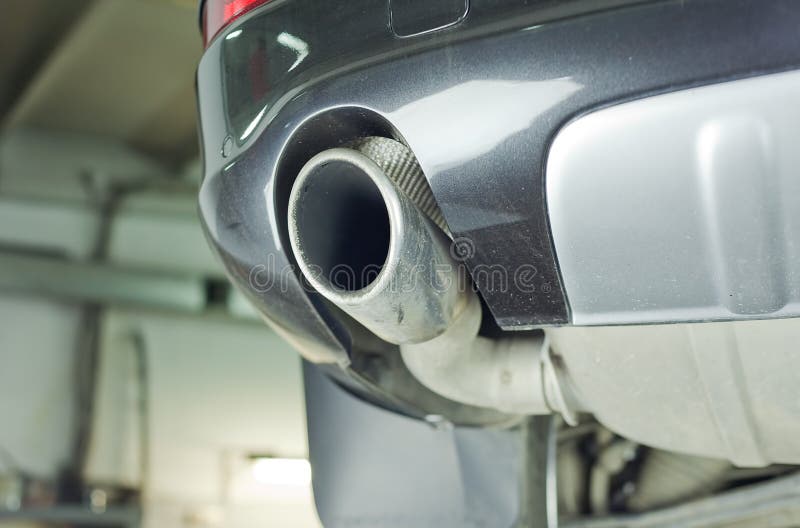 The Exhaust Pipe of the Car, the Bottom View. Stock Photo Image of