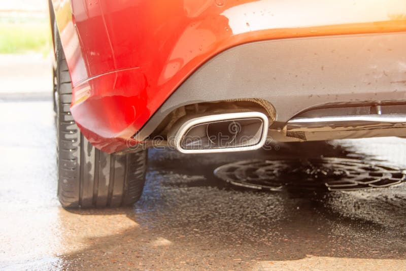 The Exhaust Pipe is Flat Shaped on a Red Car Stock Photo Image of gasoline, auto 250035904