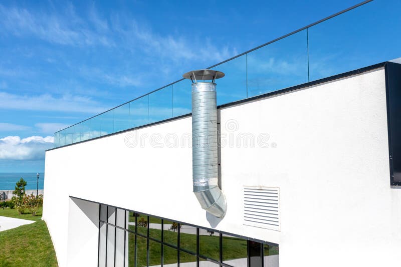 Exhaust Pipe on the Roof of the Building. Ventilation Stock Image