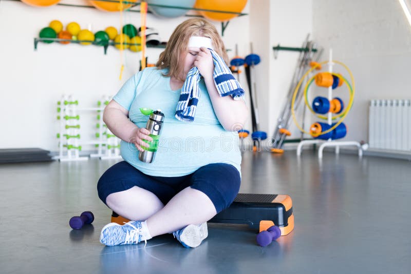 Exhausted fat Woman after Workout stock photography Exhausted fat Woman after Workout stock photography