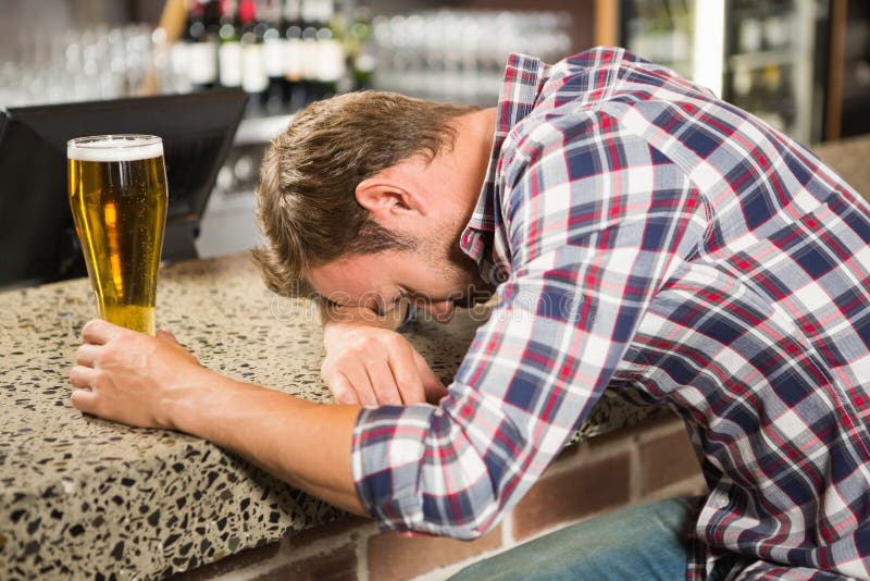 Exhausted Man Leaning His Head on the Counter Stock Image - Image of ...