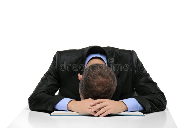 Exhausted man sleeping over the book isolated on white background