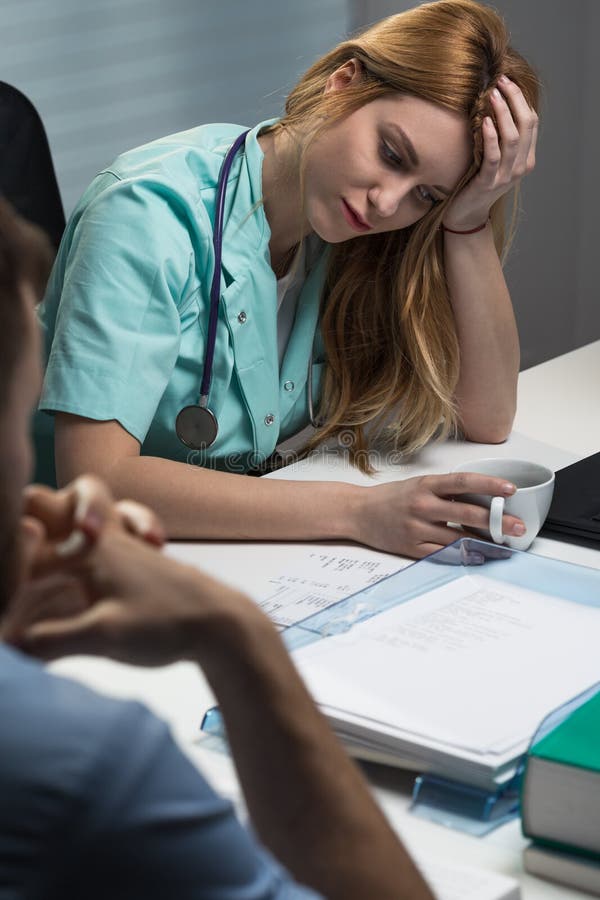 Exhausted medical staff stock photo. Image of occupation 60497628