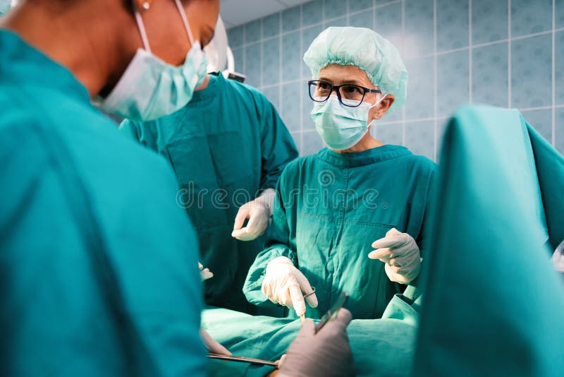 Exhausted Surgeons at the Emergency Room As a Sign of Stress and Overwork  Stock Image - Image of hospital, specialist: 217163329