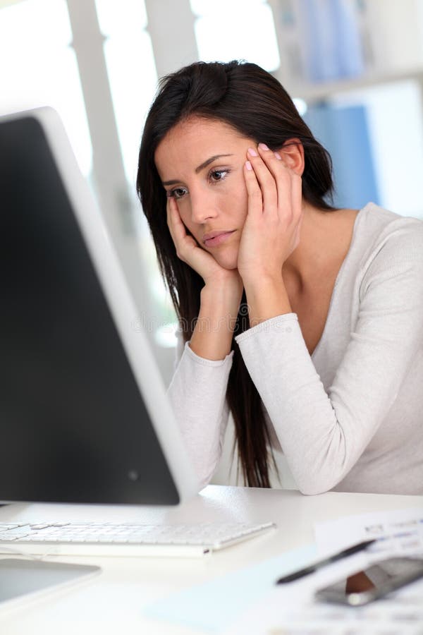 Exhausted woman at work