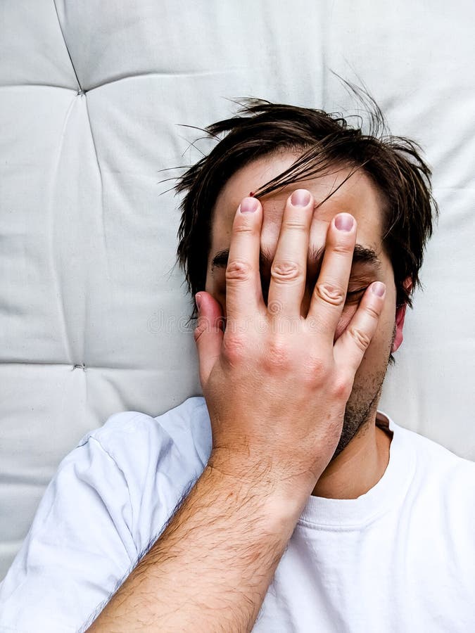 Exhausted Young Man on Bed - Frustrated Man