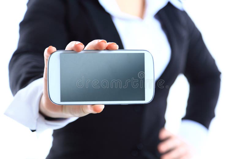 Young Woman Showing display of new touch mobile cell phone on a white background. Focus on hand with cellphone. Young Woman Showing display of new touch mobile cell phone on a white background. Focus on hand with cellphone