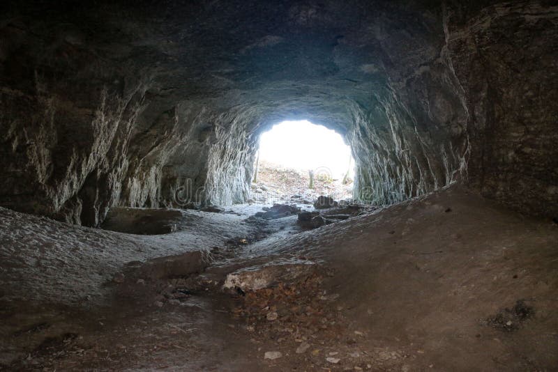 Exit from Cave, with Natural Stone Walls. Exit from Mountain To