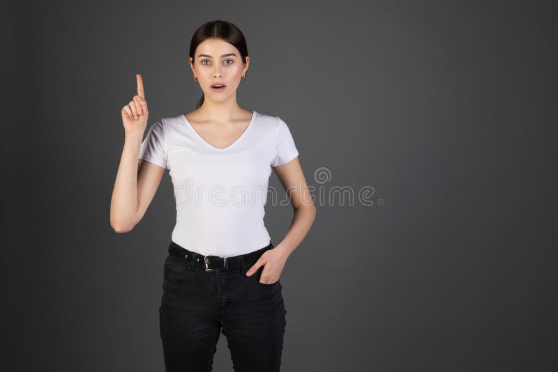 Exited surprised cheerful european woman with brunette hair , wearing casual clothes royalty free stock photography Exited surprised cheerful european woman with brunette hair , wearing casual clothes royalty free stock photography