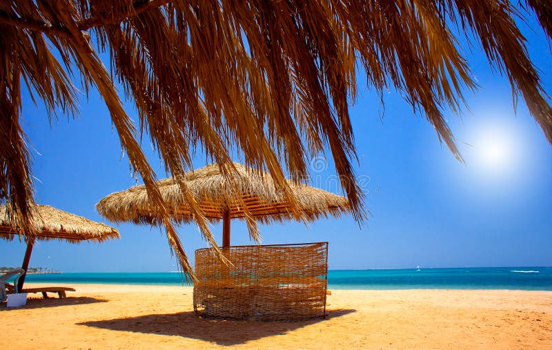 Exotic beach and gulf against blue sky.