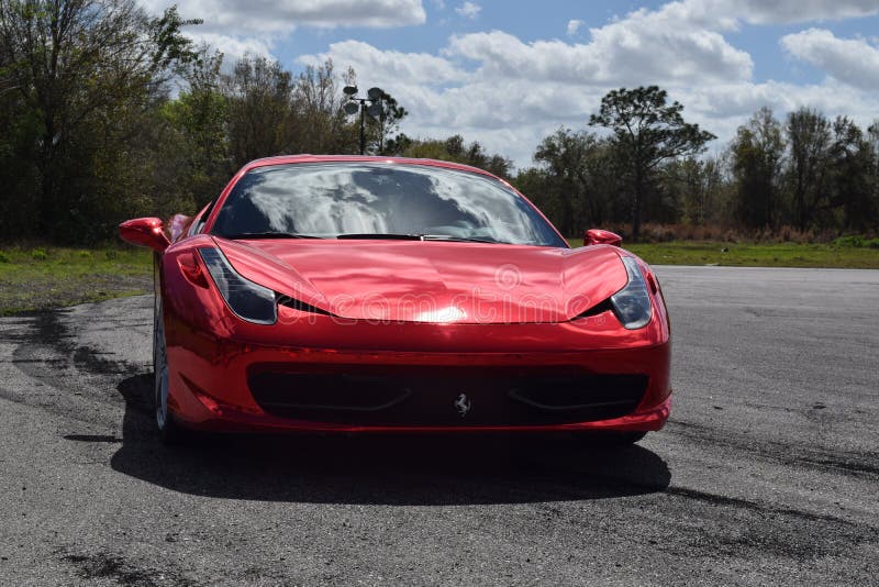 Red Ferrari with Mirror Paint on a Track in Florida Editorial Image