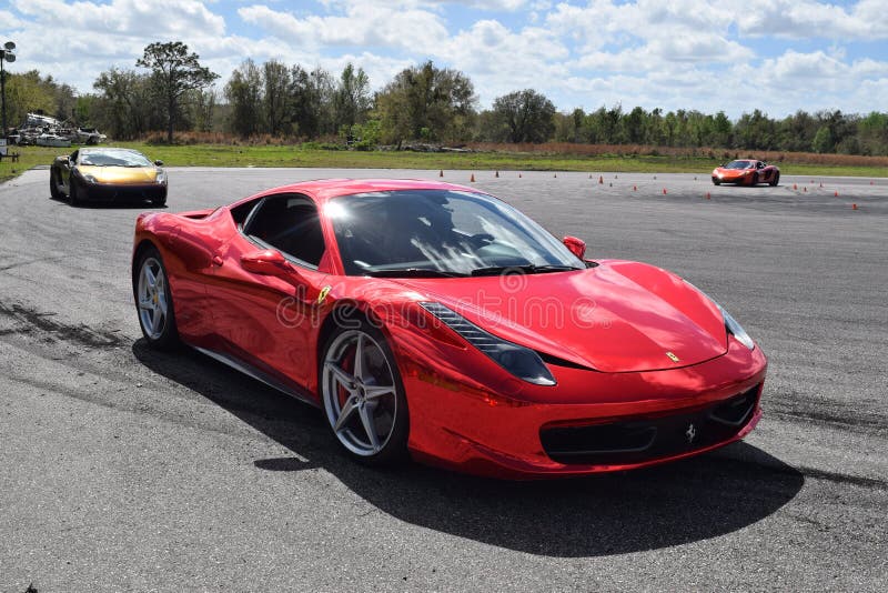 Red Ferrari with Mirror Paint on a Track in Florida Editorial Stock