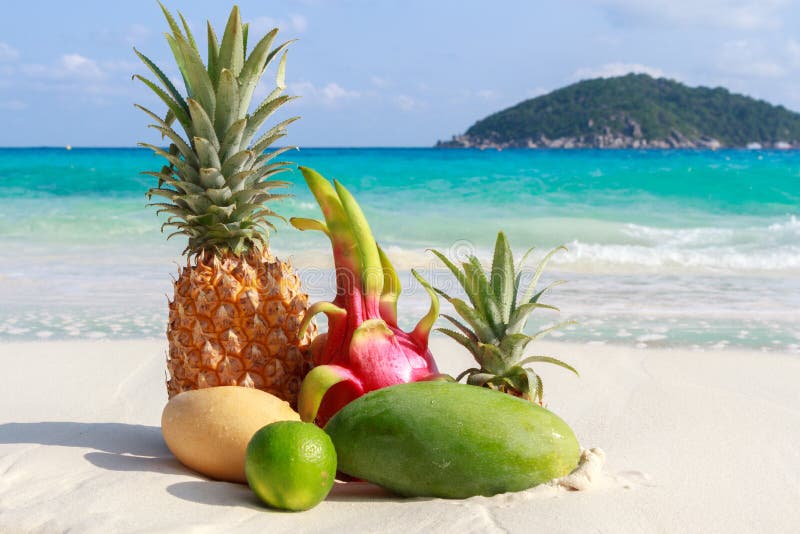 Pineapple Fruit on Sand Against Turquoise Water. Similan Islands