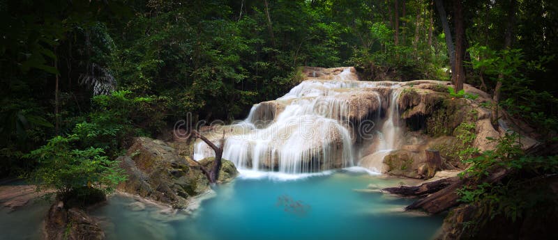 Exotic tropical waterfall in green jungle forest