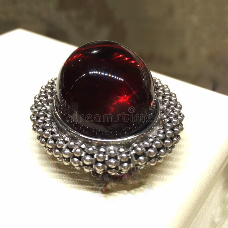 Expensive luxury jewelry in silver and red amber. stock photos Expensive luxury jewelry in silver and red amber. stock photos