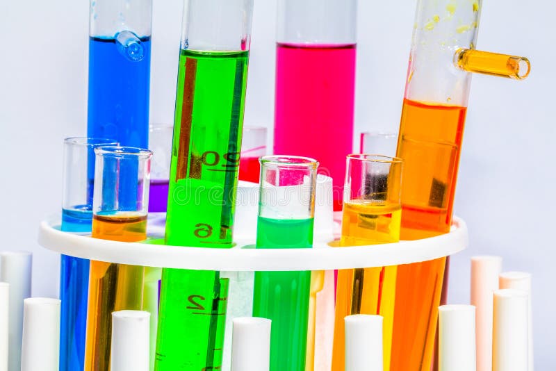 Experiments in Mixing Chemical Substances into Glass Tubes Stock Photo