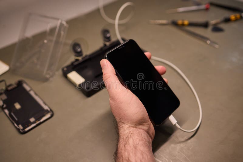 Expert Smartphone Repair Using Advanced Precision Tools for Optimal Performance and Quality stock photo