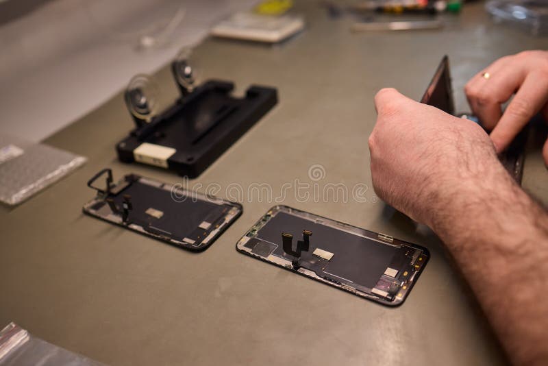 Expert Smartphone Repair Using Advanced Precision Tools for Optimal Performance and Quality stock photography