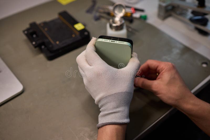 Expert Smartphone Repair Using Advanced Precision Tools for Optimal Performance and Quality royalty free stock photo