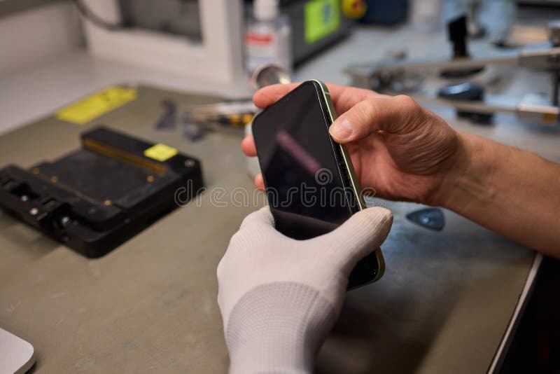 Expert Smartphone Repair Using Advanced Precision Tools for Optimal Performance and Quality royalty free stock photo