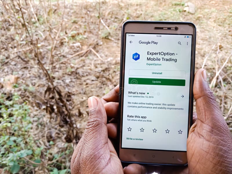 Expertoption mobile trading android app displayed on digital screen in India dec 2019