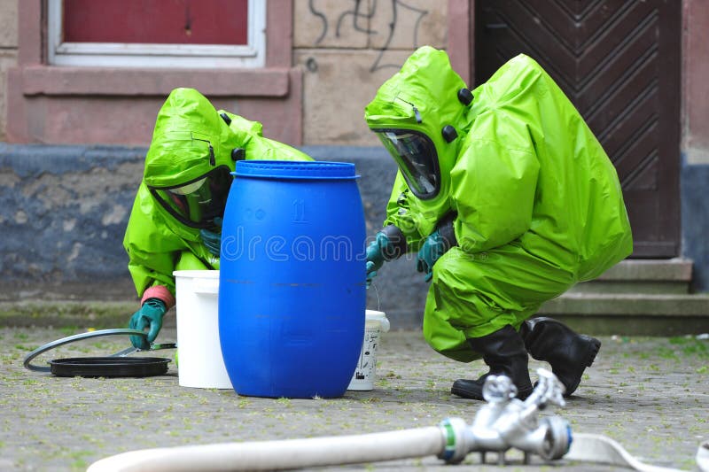 Experts investigating chemical accident stock photography